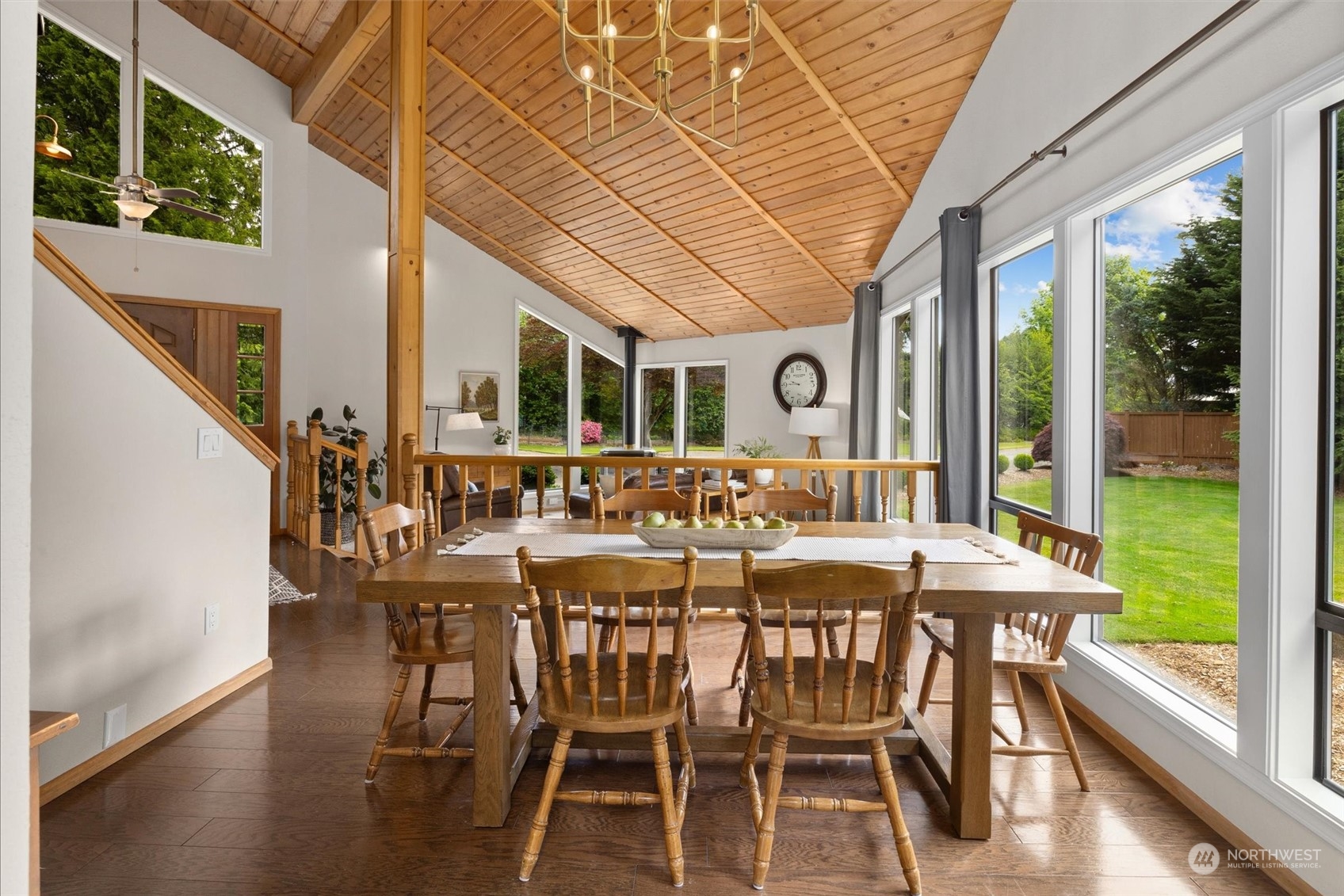 20622 37th Avenue Southeast Bothell, WA 98021 - Photo 9 of 38 a view of an outside dining space with furniture window and wooden floor