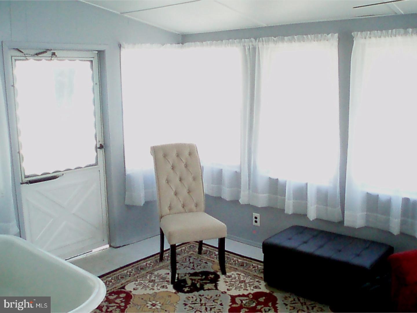 122 Wildflower Road Levittown, PA 19057 - Photo 15 of 25 Sun Room