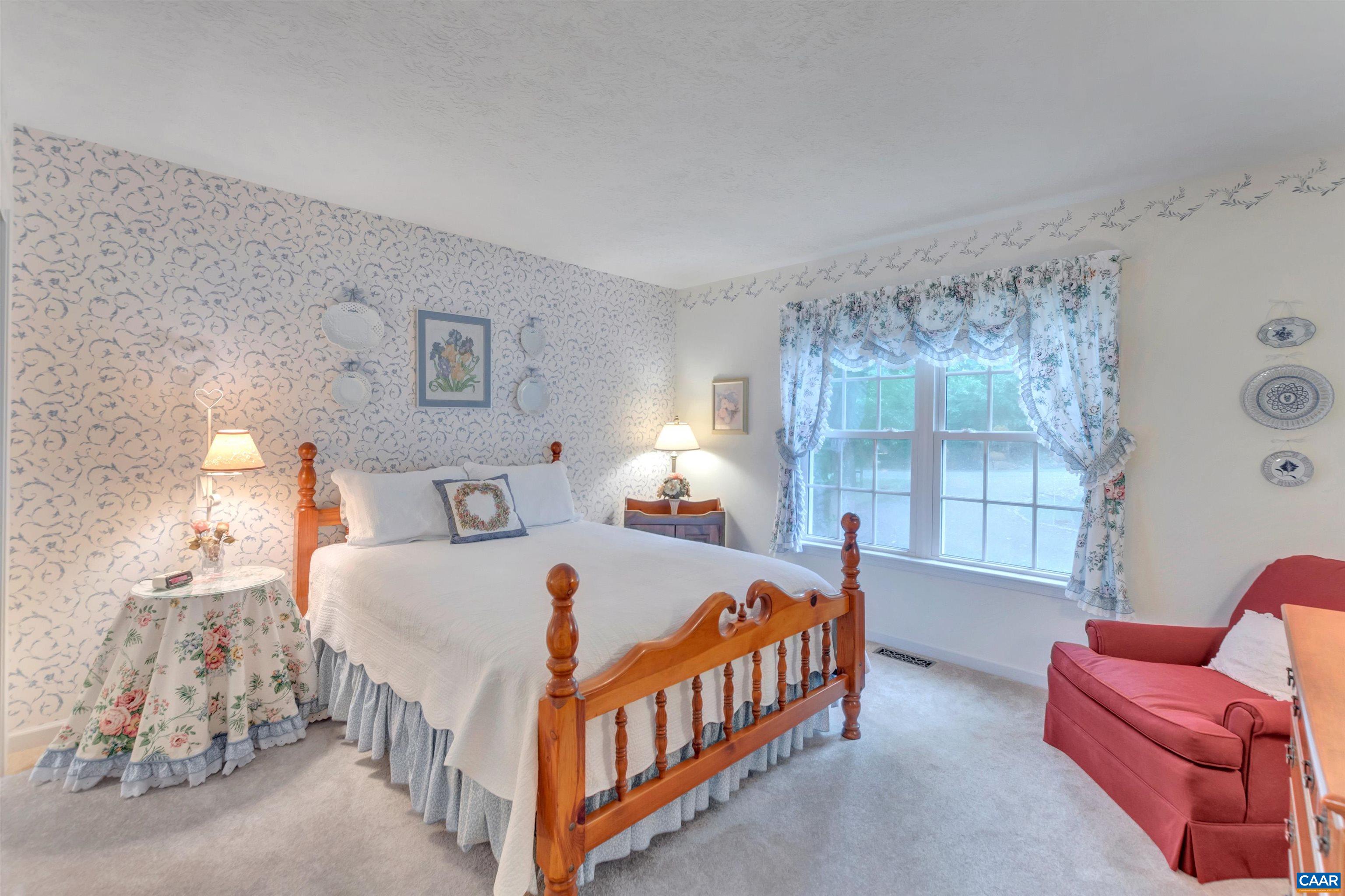 8 Out Of Bounds Road Palmyra, VA 22963 - Photo 41 of 66 a bedroom with a bed and a couch