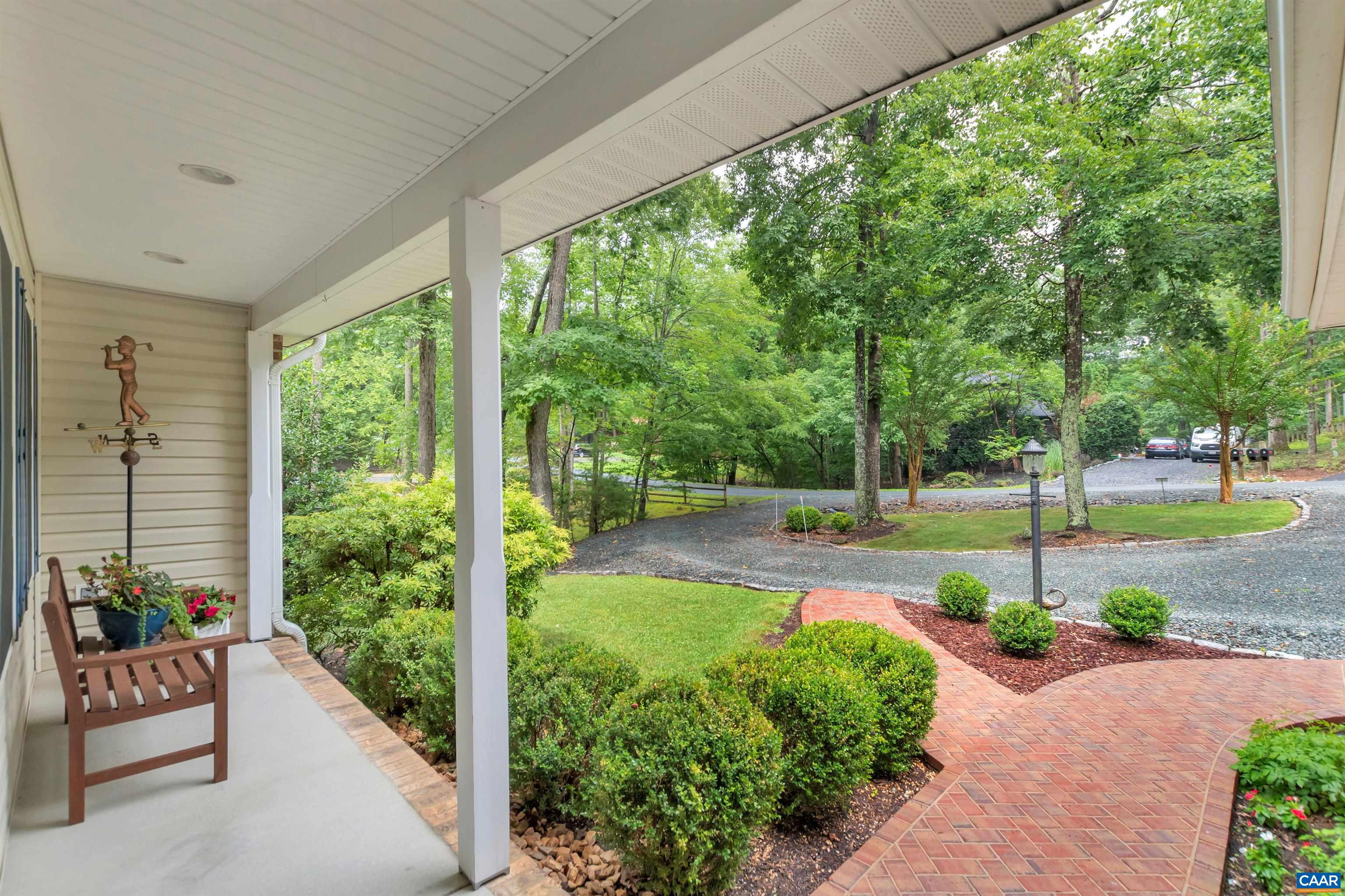 8 Out Of Bounds Road Palmyra, VA 22963 - Photo 5 of 66 a view of a garden with patio