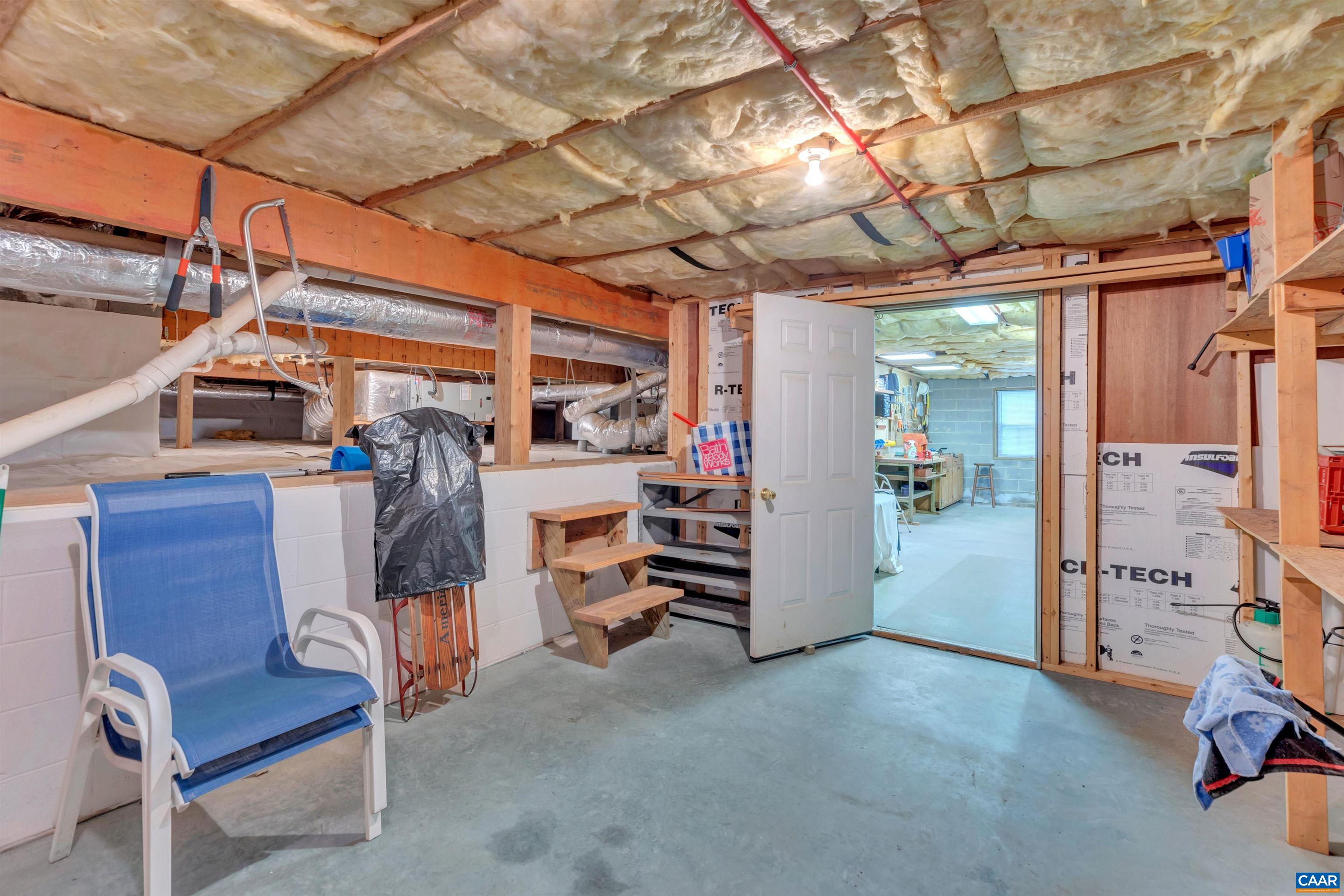 8 Out Of Bounds Road Palmyra, VA 22963 - Photo 53 of 66 a view of a room with gym equipment