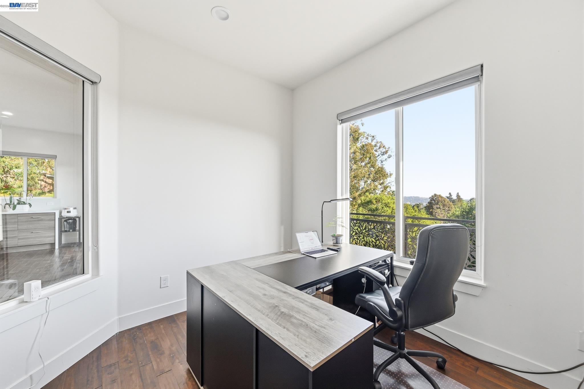 4683 Proctor Road Castro Valley, CA 94546 - Photo 12 of 88 a view of a workspace with furniture and a window