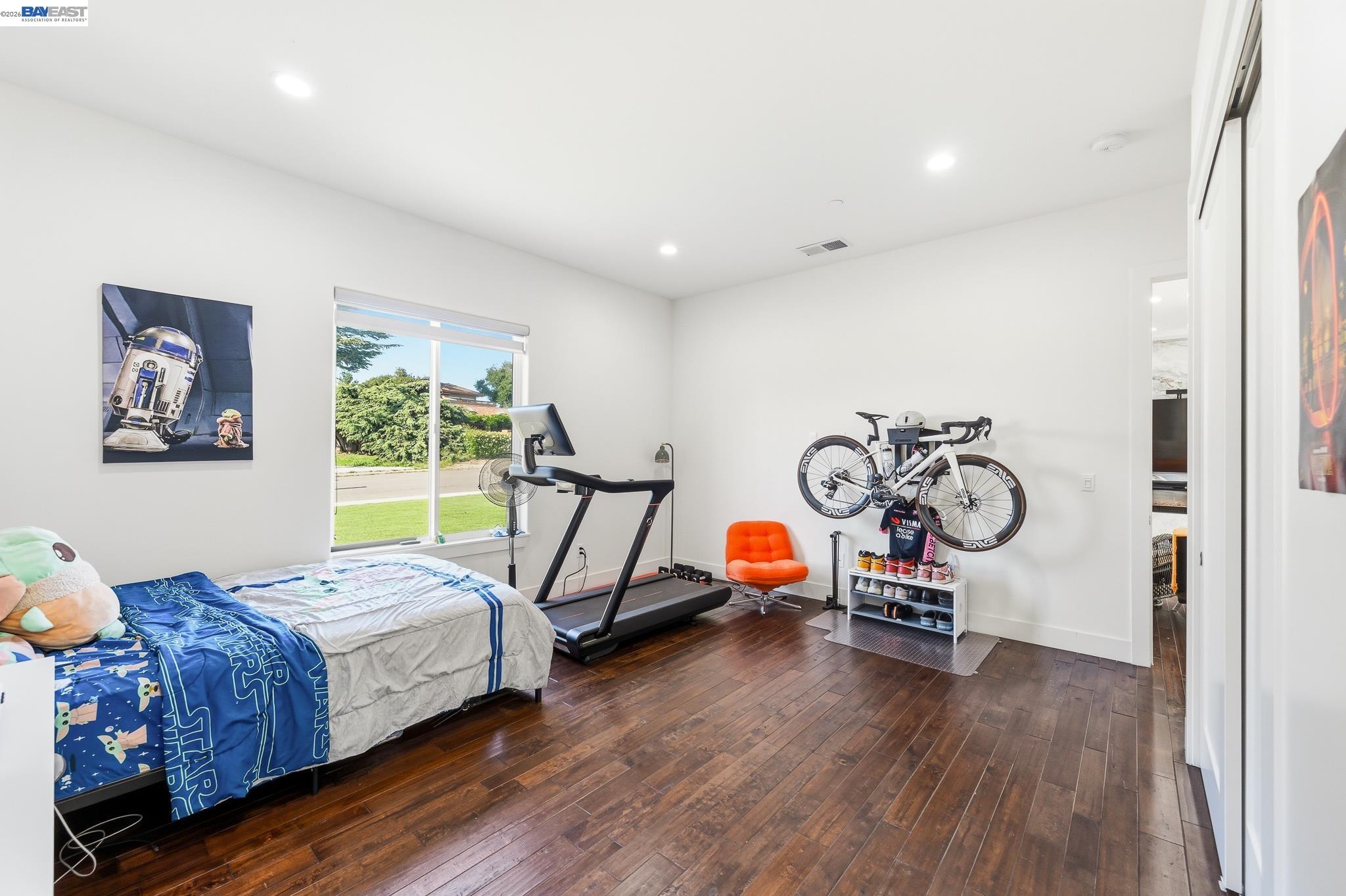 4683 Proctor Road Castro Valley, CA 94546 - Photo 27 of 88 a bedroom with bed and a window