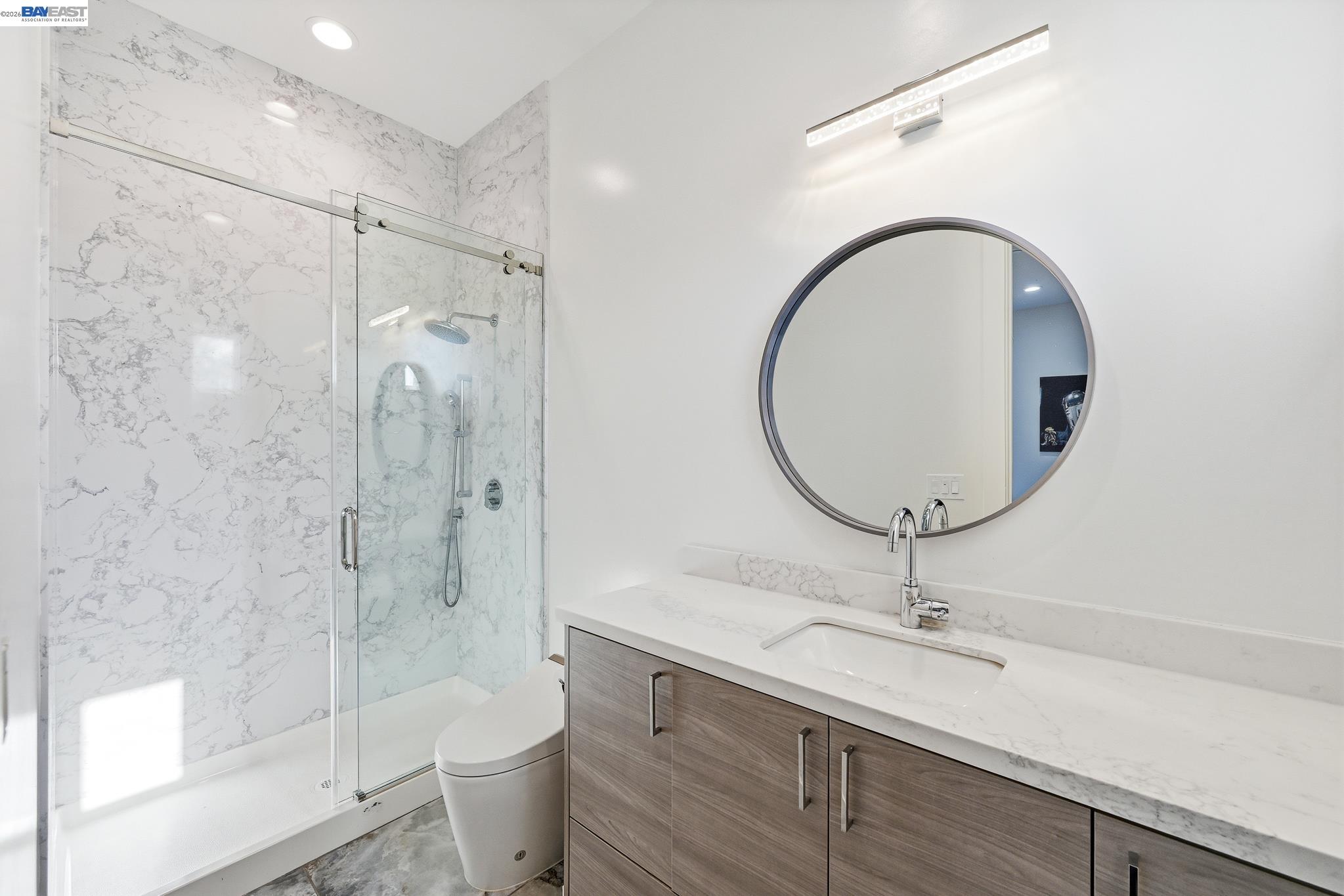 4683 Proctor Road Castro Valley, CA 94546 - Photo 29 of 88 a bathroom with a sink a toilet and shower
