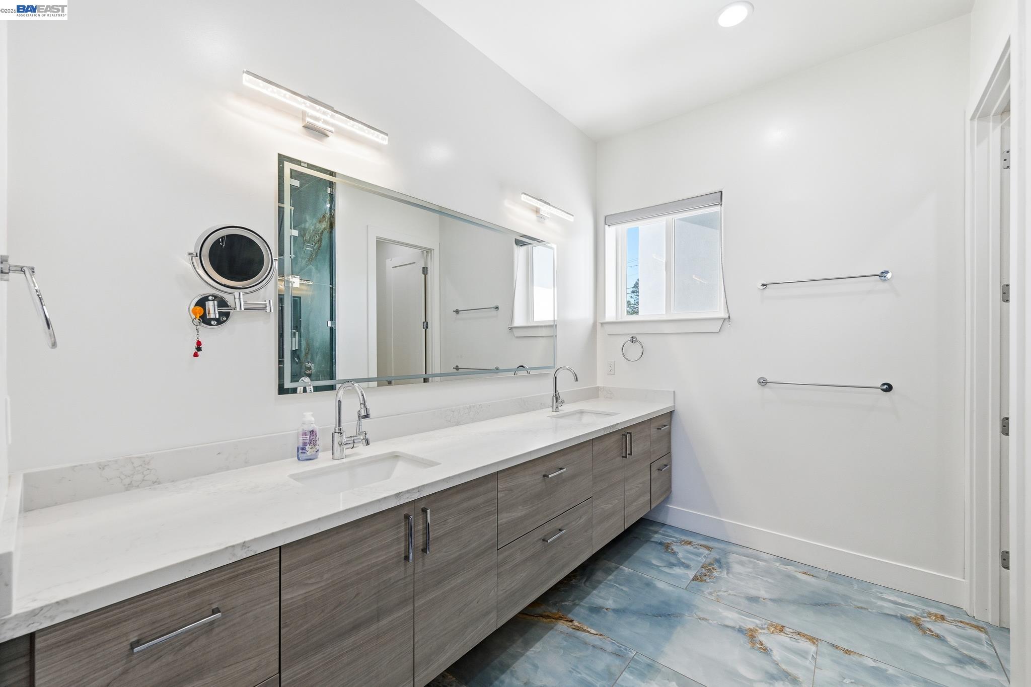 4683 Proctor Road Castro Valley, CA 94546 - Photo 33 of 88 a bathroom with a double vanity sink mirror and double