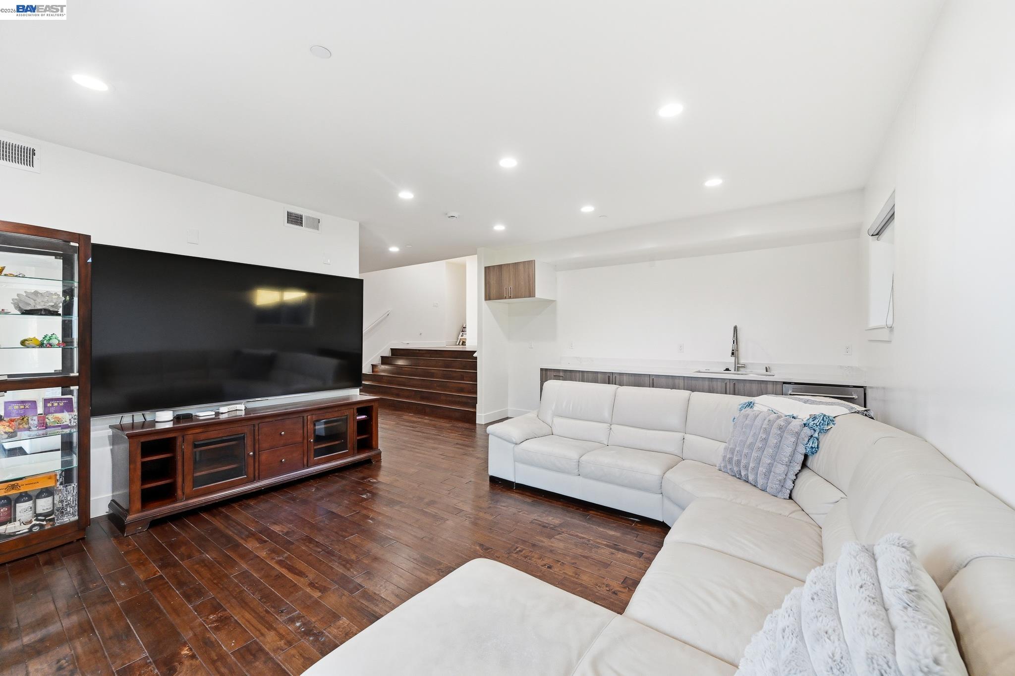 4683 Proctor Road Castro Valley, CA 94546 - Photo 50 of 88 a living room with furniture and a flat screen tv