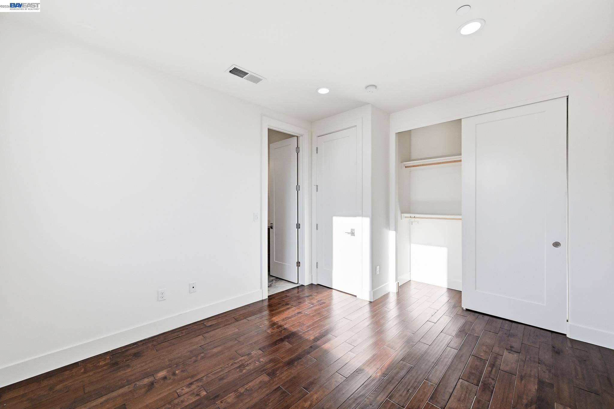 4683 Proctor Road Castro Valley, CA 94546 - Photo 55 of 88 a view of an empty room with wooden floor