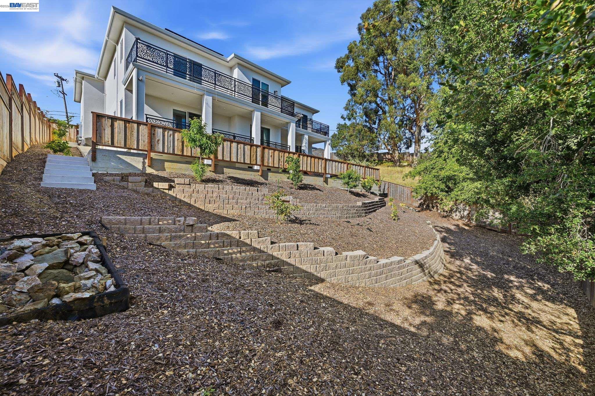 4683 Proctor Road Castro Valley, CA 94546 - Photo 76 of 88 a view of a large building with many windows