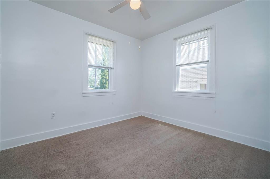 1537 Marshall Road Monaca, PA 15061 - Photo 11 of 25 Second bedroom on the main floor complete with ceiling fan and loads of natural light.