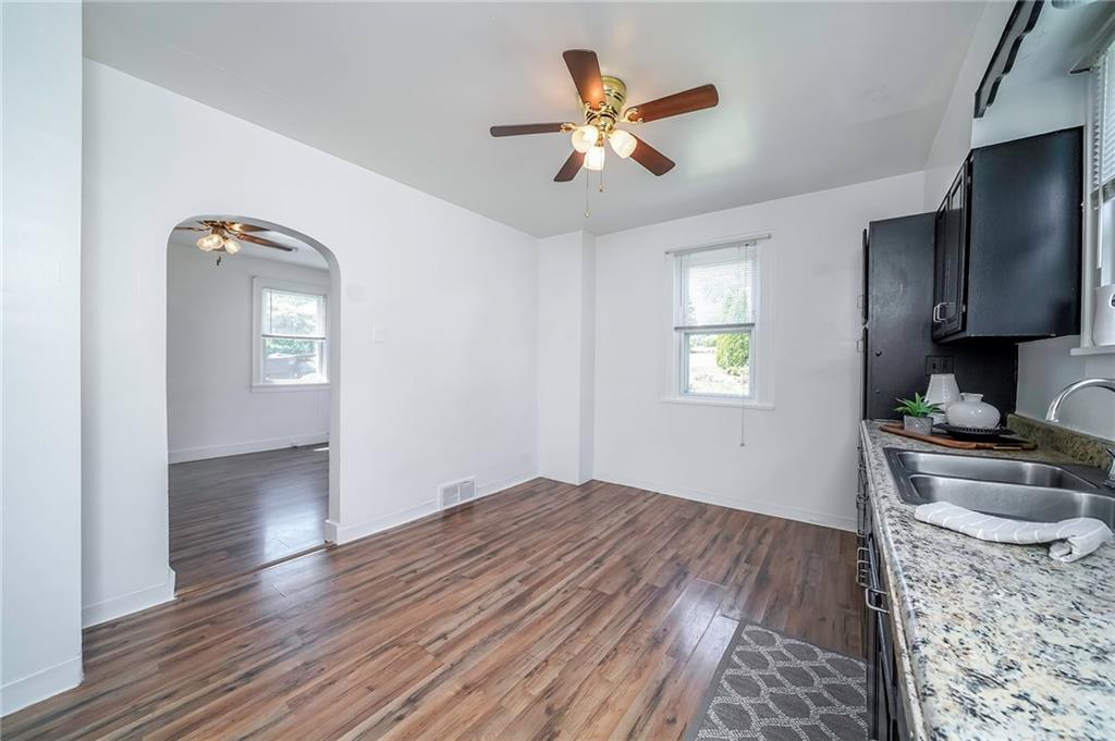 1537 Marshall Road Monaca, PA 15061 - Photo 9 of 25 Kitchen with ceiling fan. Leads to the living room for easy entertaining.
