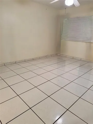 a view of a room and window