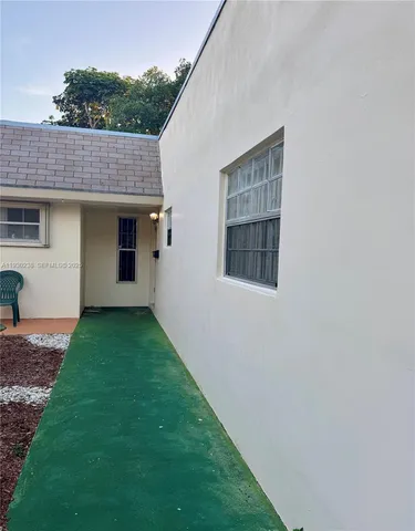 a view of a backyard with a garden