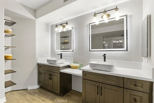 a view of a hallway with washer and dryer