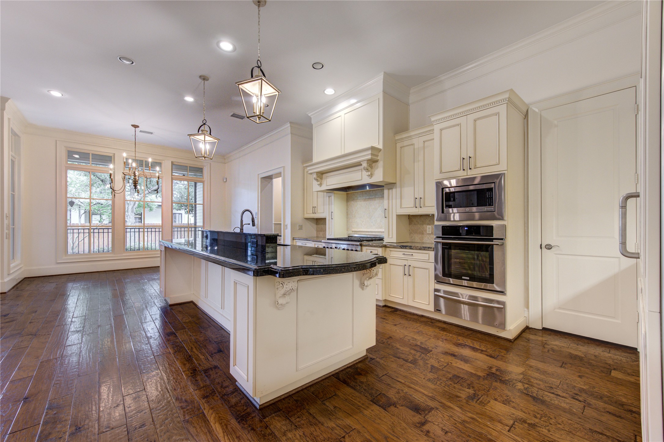 4615 Laurel Street Bellaire, TX 77401 - Photo 18 of 48 Kitchen views showing the electric oven, microwave, warming drawer, walk-in pantry