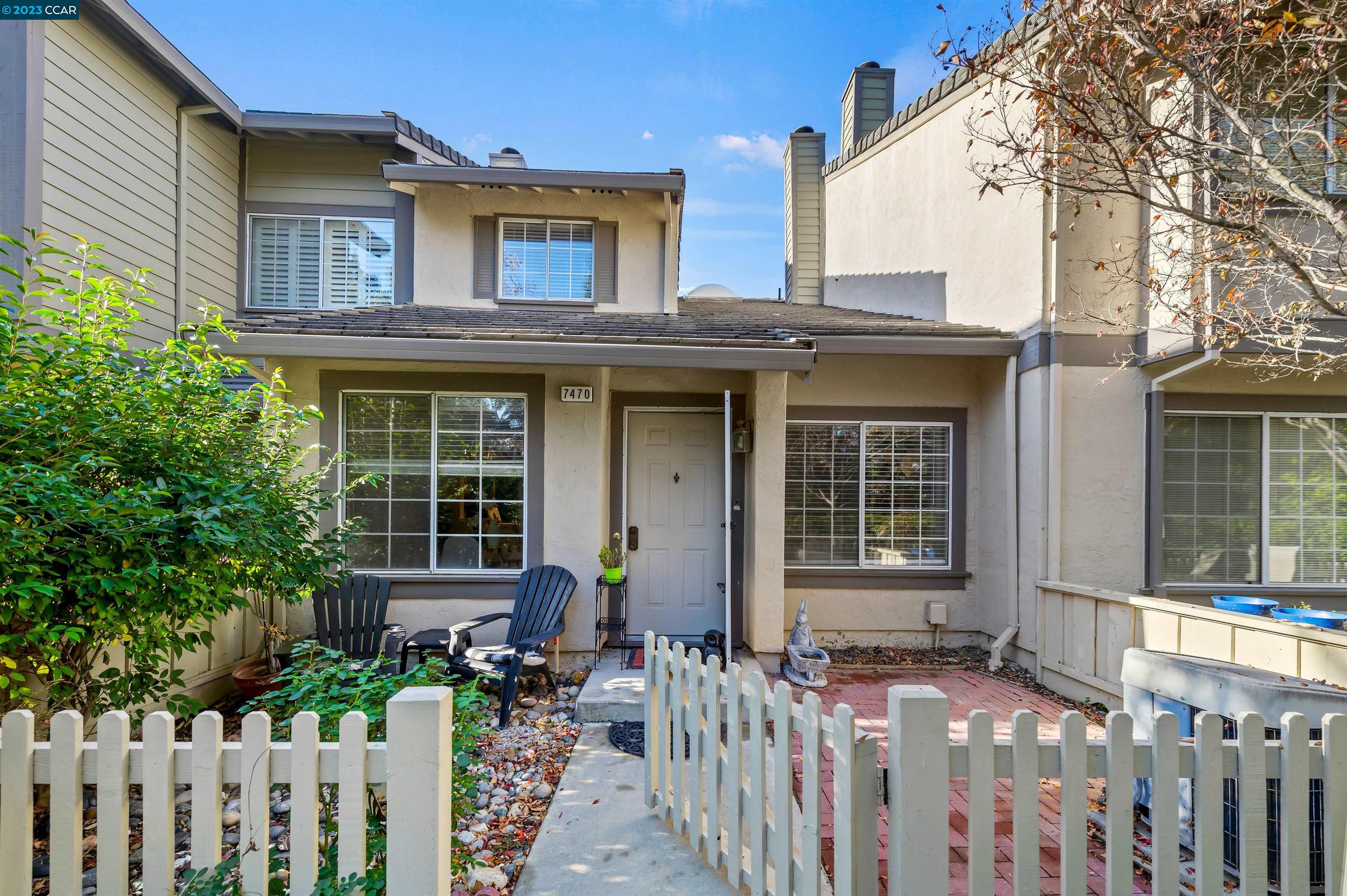 a front view of a house with a porch