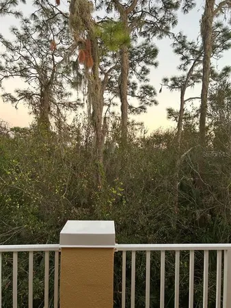a view of a wooden fence from a balcony