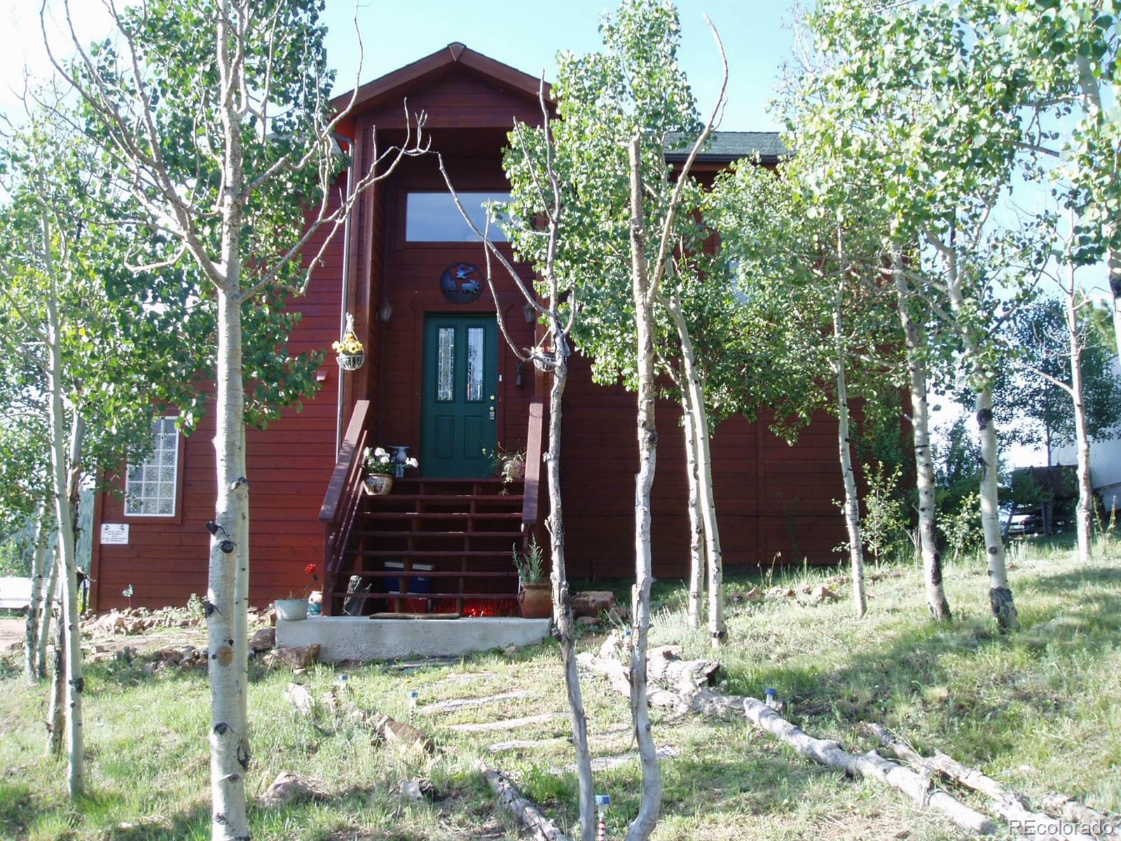 98 Wilson Road Bailey, CO 80421 - Photo 1 of 1 a front view of a house