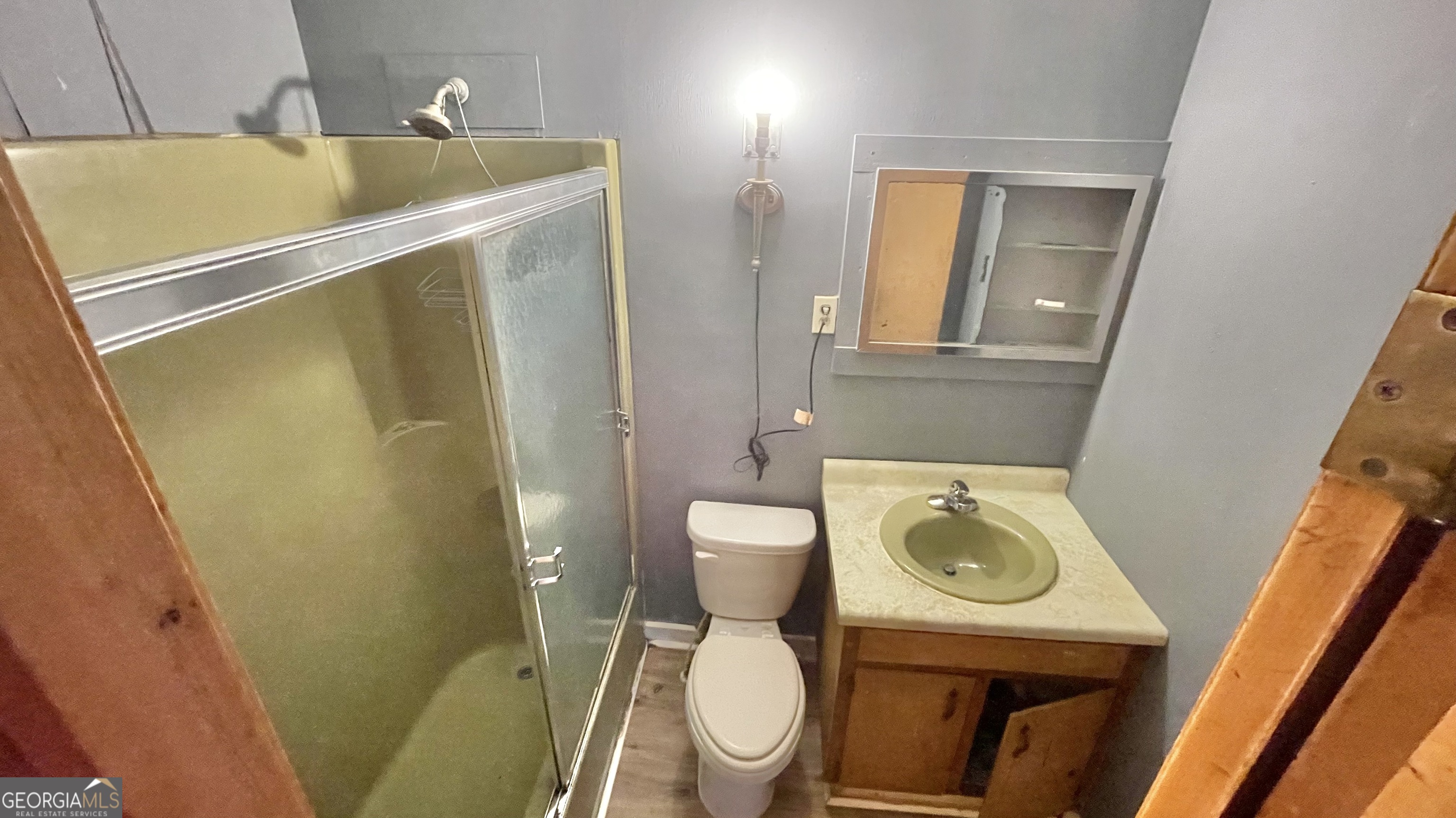 758 Jack Sharp Road Colbert, GA 30628 - Photo 12 of 14 a bathroom with a toilet and a sink