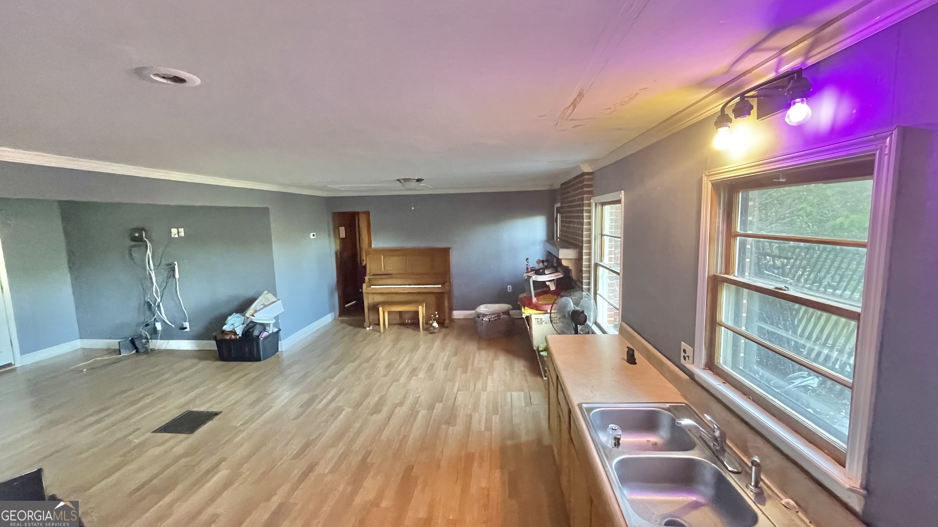 758 Jack Sharp Road Colbert, GA 30628 - Photo 3 of 14 a playing room with furniture and a wooden floor