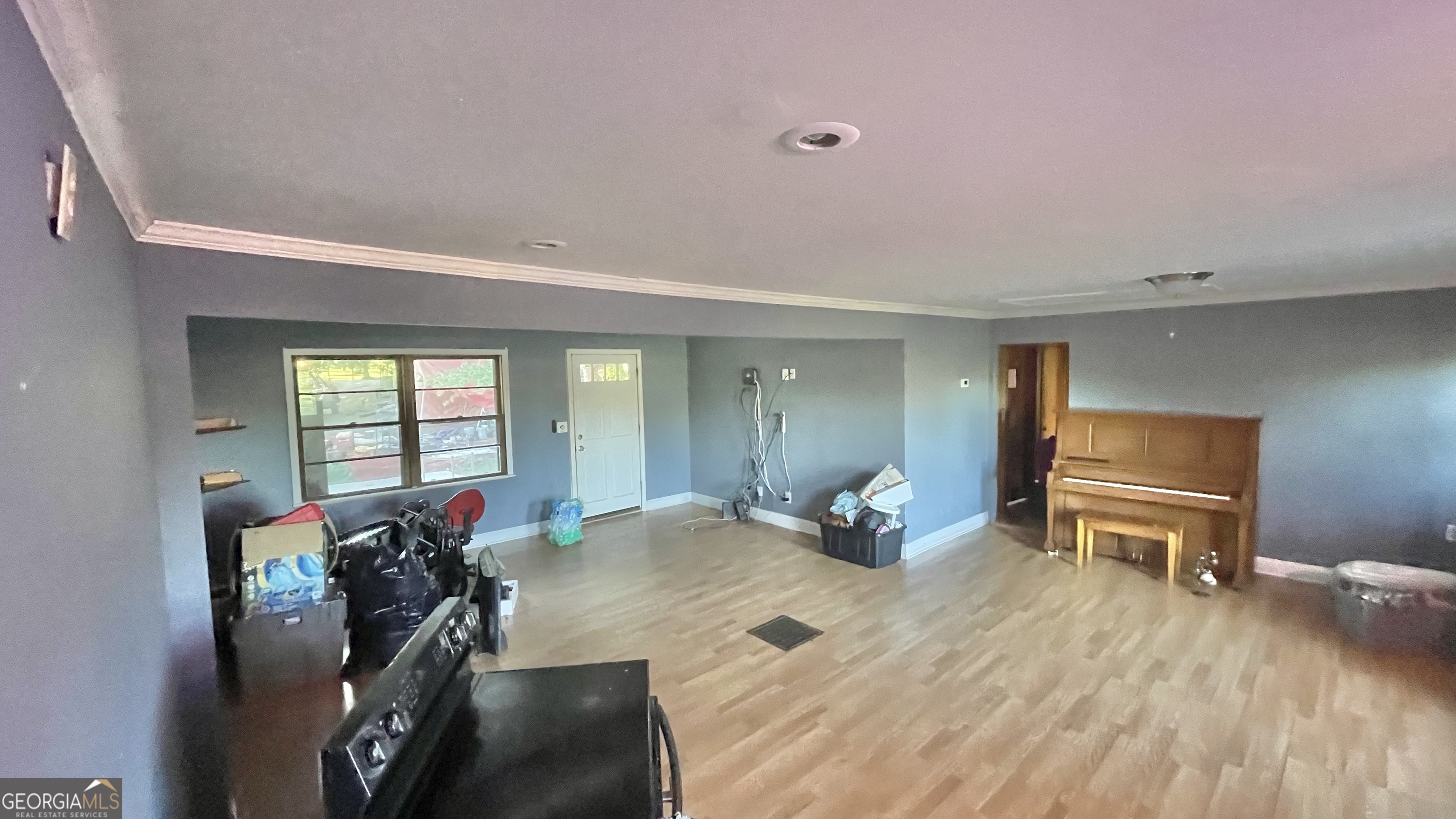 758 Jack Sharp Road Colbert, GA 30628 - Photo 4 of 14 a bed room with a bed and a chair