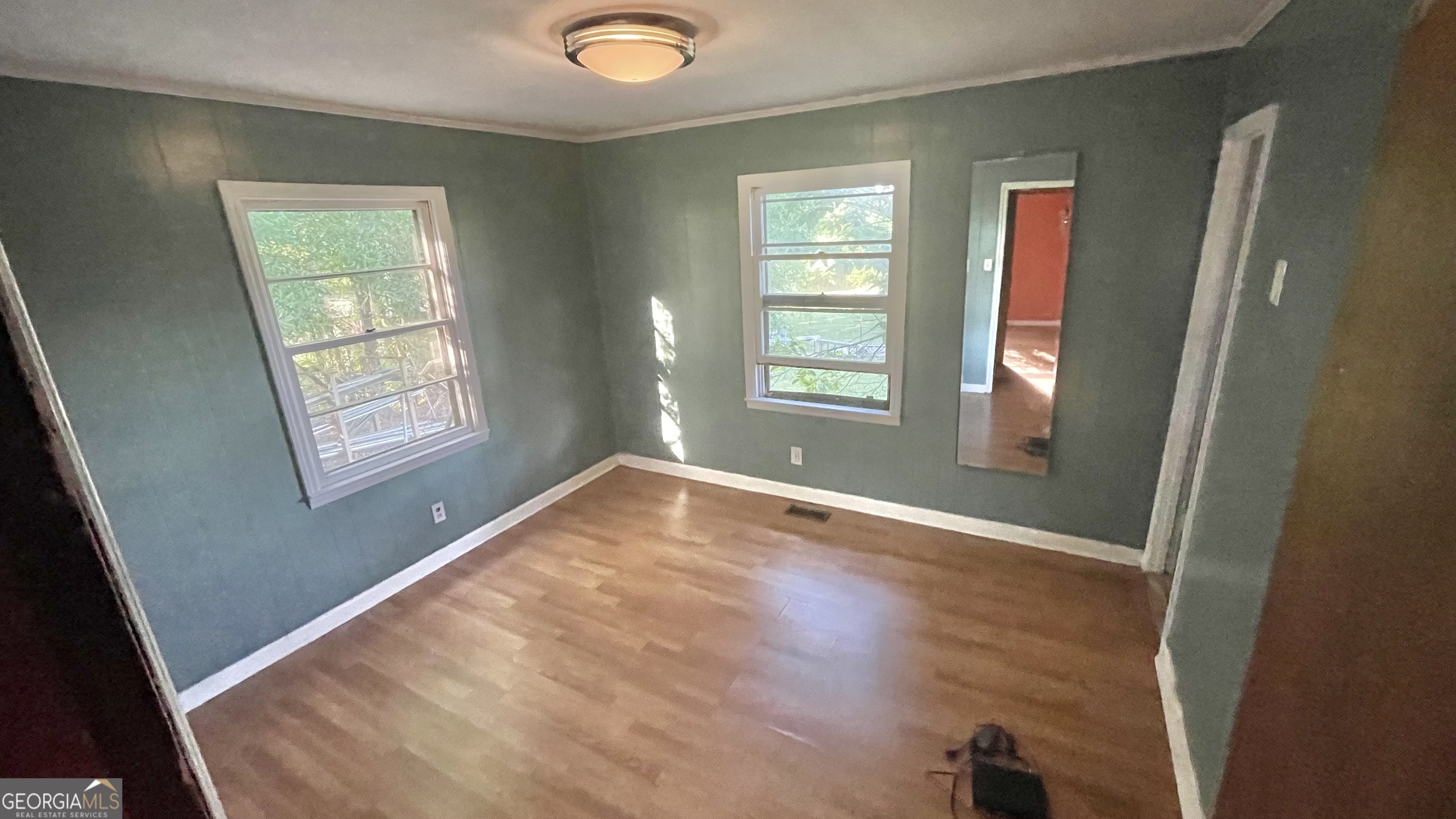 758 Jack Sharp Road Colbert, GA 30628 - Photo 7 of 14 a view of empty room with windows