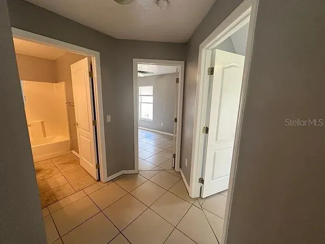 a view of a bathroom with a glass door