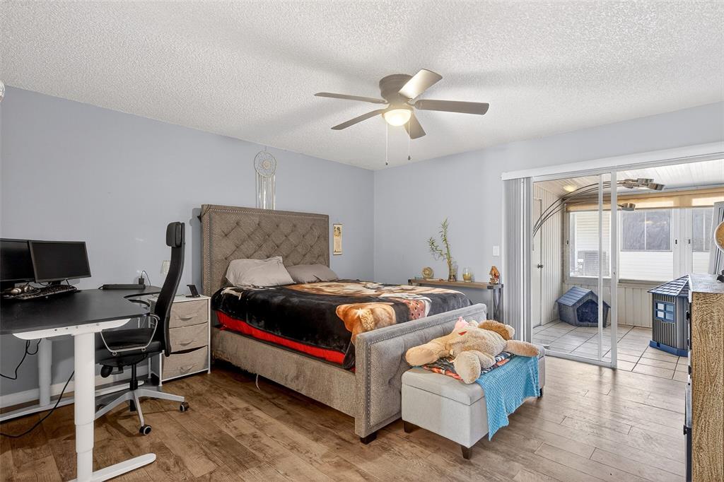 622 Ridge Terrace Winter Haven, FL 33881 - Photo 18 of 29 a bedroom with a bed and a window