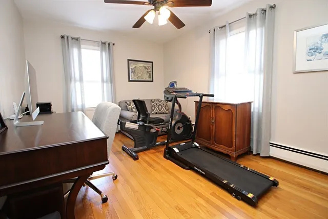 a bathroom with a double vanity sink a mirror and a shower