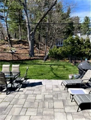 a backyard of a house with lots of green space