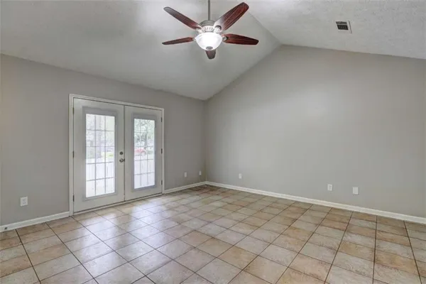 a view of an empty room and window