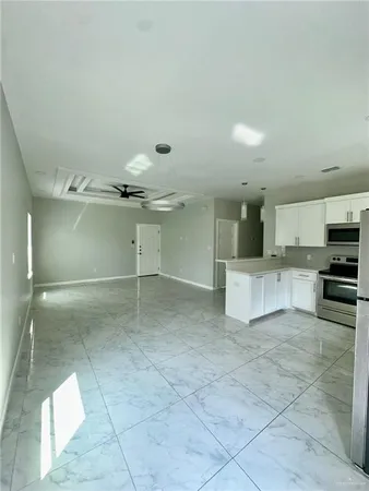 a view of a kitchen with a sink