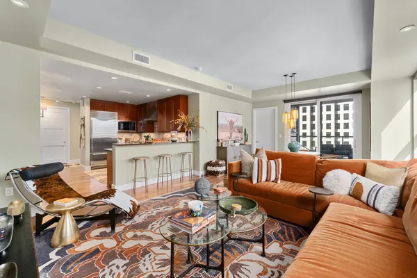 a living room with furniture and a window