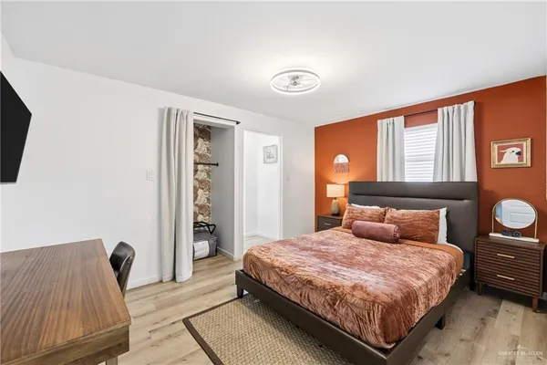 a bathroom with a toilet and a sink