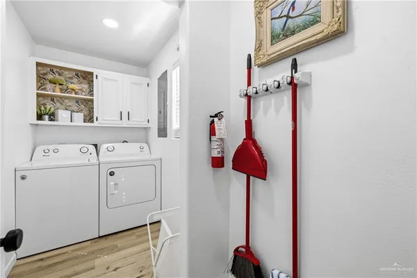 swimming pool view with a seating space