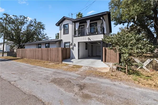 a kitchen with a refrigerator a sink and dishwasher