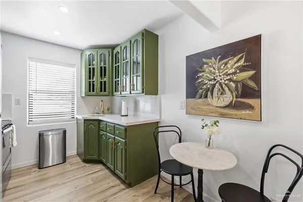 a bedroom with bed and window