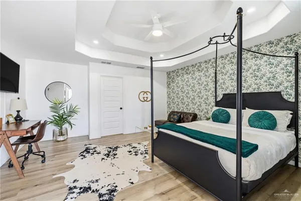 a spacious bathroom with a double vanity sink mirror and toilet
