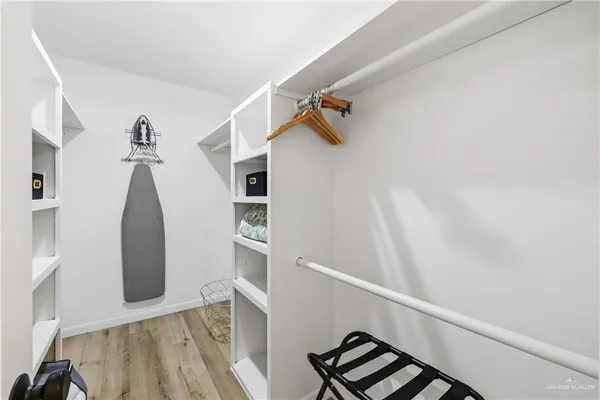 a view of a balcony with wooden floor