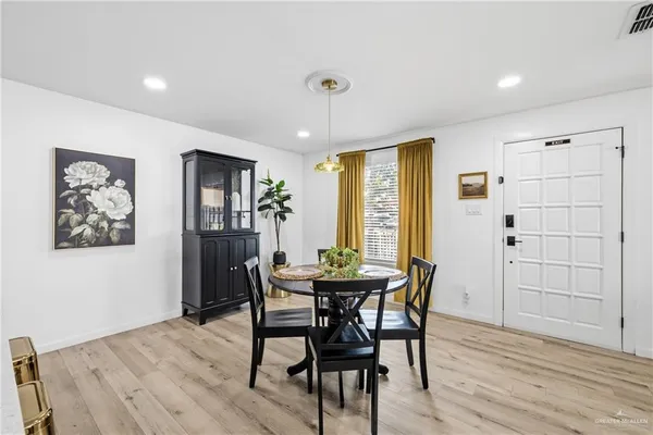 a bed room with a bed and a wall painting