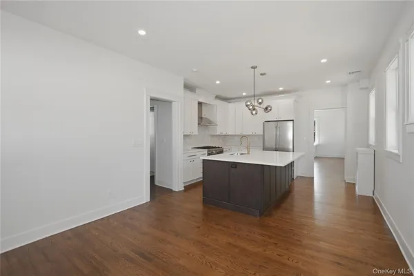a large kitchen with a lot of counter space