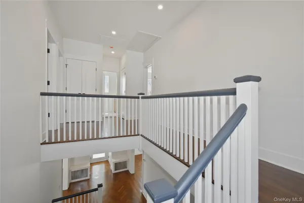 a view of entryway with wooden floor