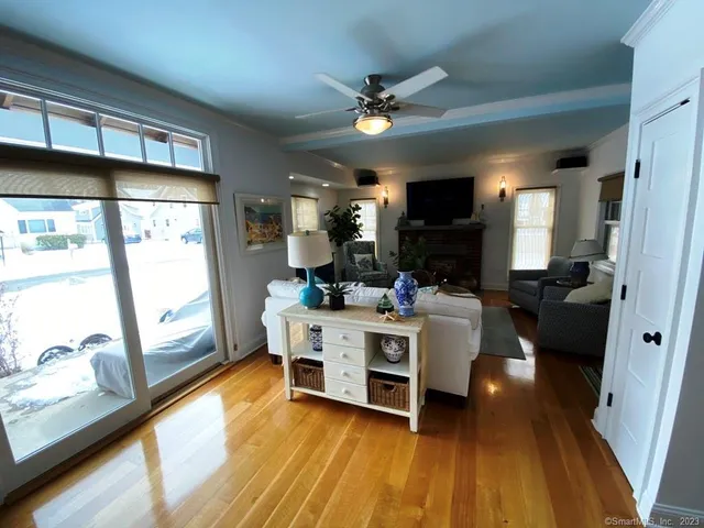 a view of living room with furniture and flat screen tv