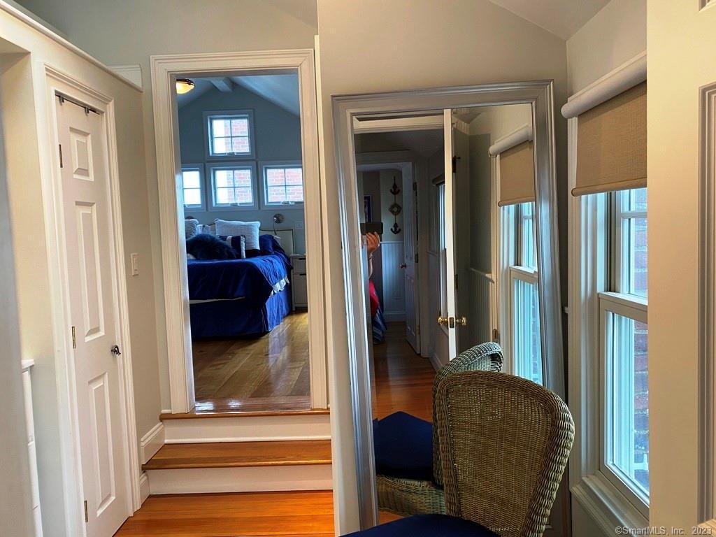 27 Brightwater Road Old Lyme, CT 06371 - Photo 22 of 34 a view of a livingroom from a hallway