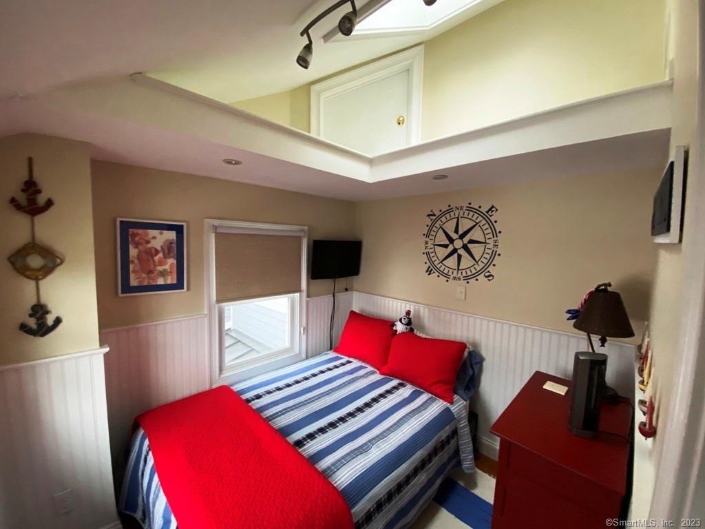 27 Brightwater Road Old Lyme, CT 06371 - Photo 27 of 34 a living room with furniture