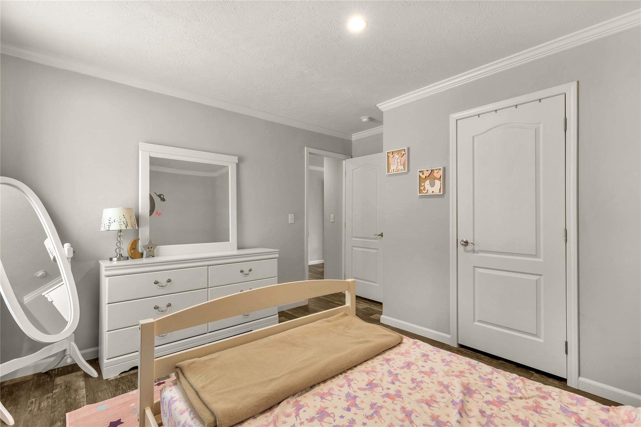 1652 Goings Road Chester, SC 29706 - Photo 24 of 35 a bedroom with a bed and a mirror on the dresser