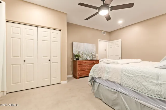 a spacious bathroom with a double vanity sink mirror and