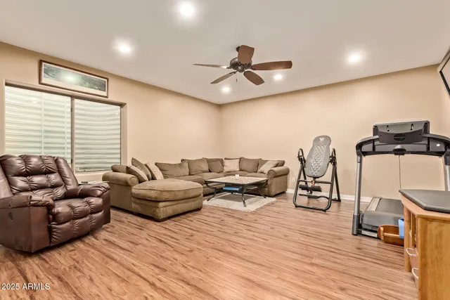 a living room with furniture and a window