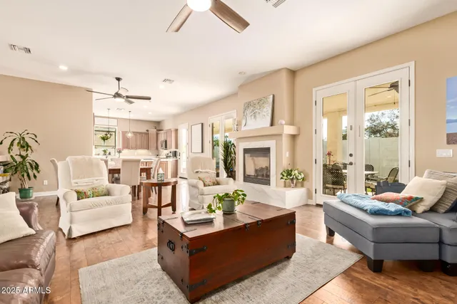 a kitchen that has a sink a stove and a refrigerator