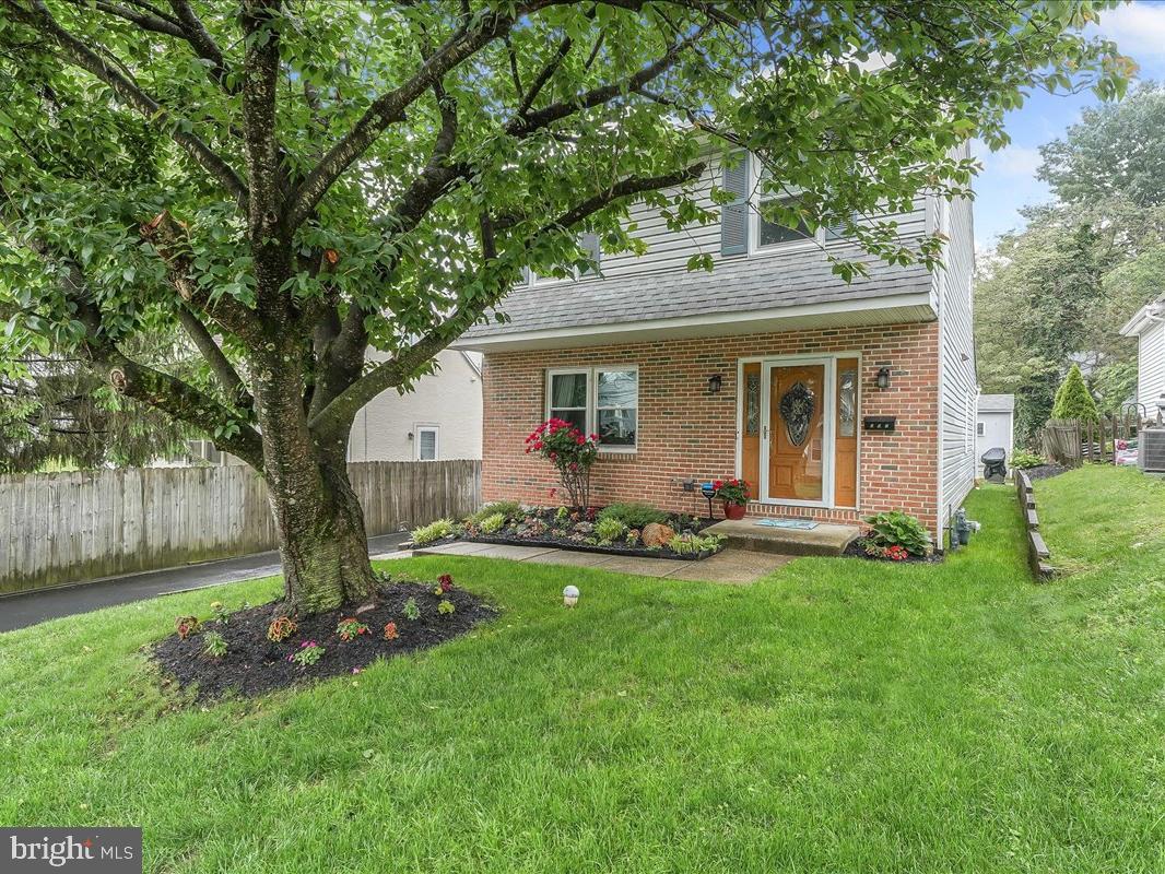 502 Ryanard Road Wallingford, PA 19086 - Photo 1 of 38 a front view of house with yard and green space