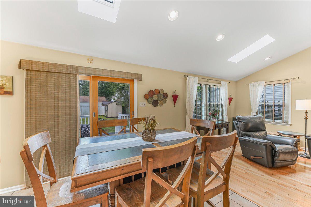 502 Ryanard Road Wallingford, PA 19086 - Photo 16 of 38 a dining room with furniture and wooden floor